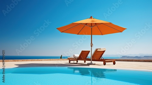 chairs for relaxing and sunbathing beside swimming pool and sea beach © dedy
