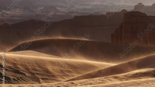 Sand blowing over dunes in wind, sandstorm in Gobi desert, Mongolia