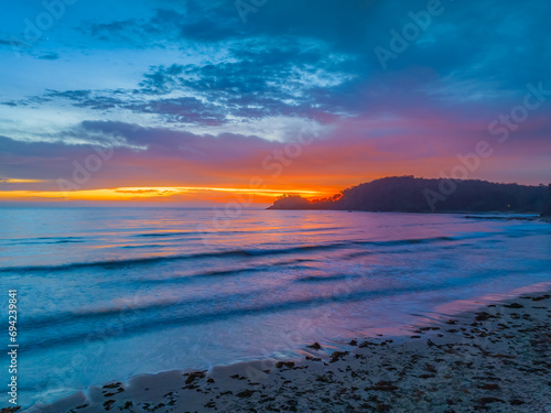 Summer Sunrise Seascape with Rain Clouds © Merrillie