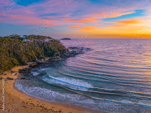 Sunrise at the seaside with high clouds photo