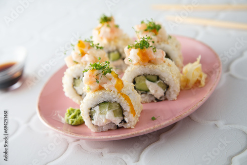 Shrimp sushi rolls with mango sauce