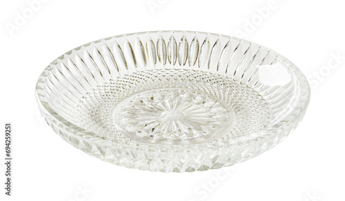 Empty cut glass saucer cutout. Beautiful vintage glass dessert plate isolated on a white background. Glass tableware for food design. Modern crockery concept.