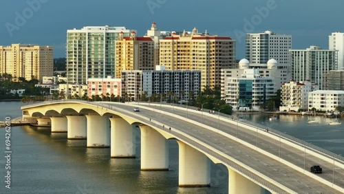 Development of housing and transportation in the US. Above view of Sarasota city, Florida with waterfront office highrise buildings and John Ringling Causeway leading from downtown to St. Armands Key photo