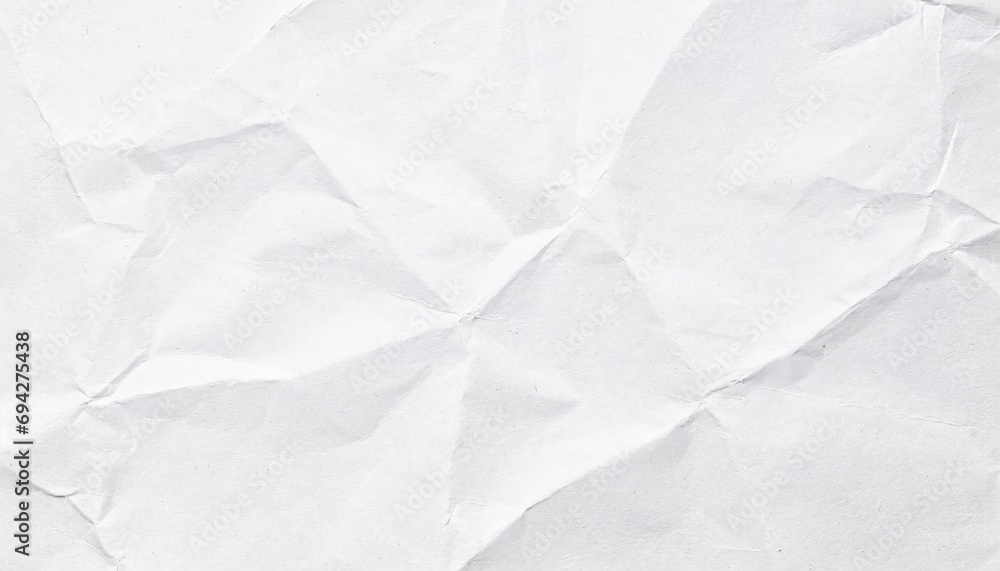 Fototapeta premium A white crumpled paper texture wallpaper.