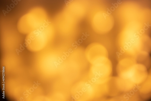 Verschwommene  Geldene Lichter mit Bokeh-Effekt
