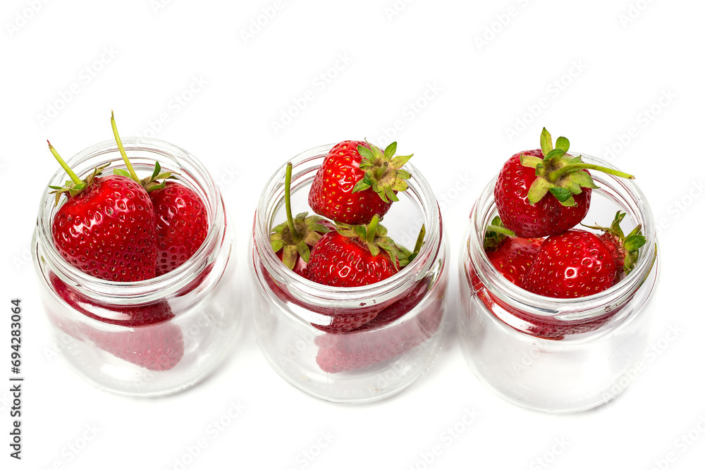 Red ripe strawberries on a white background, strawberries for dessert Red ripe strawberries on a white background, strawberries for dessert