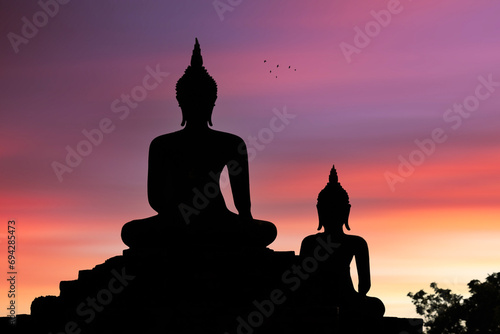 buddha statue in the sunset © imphilip
