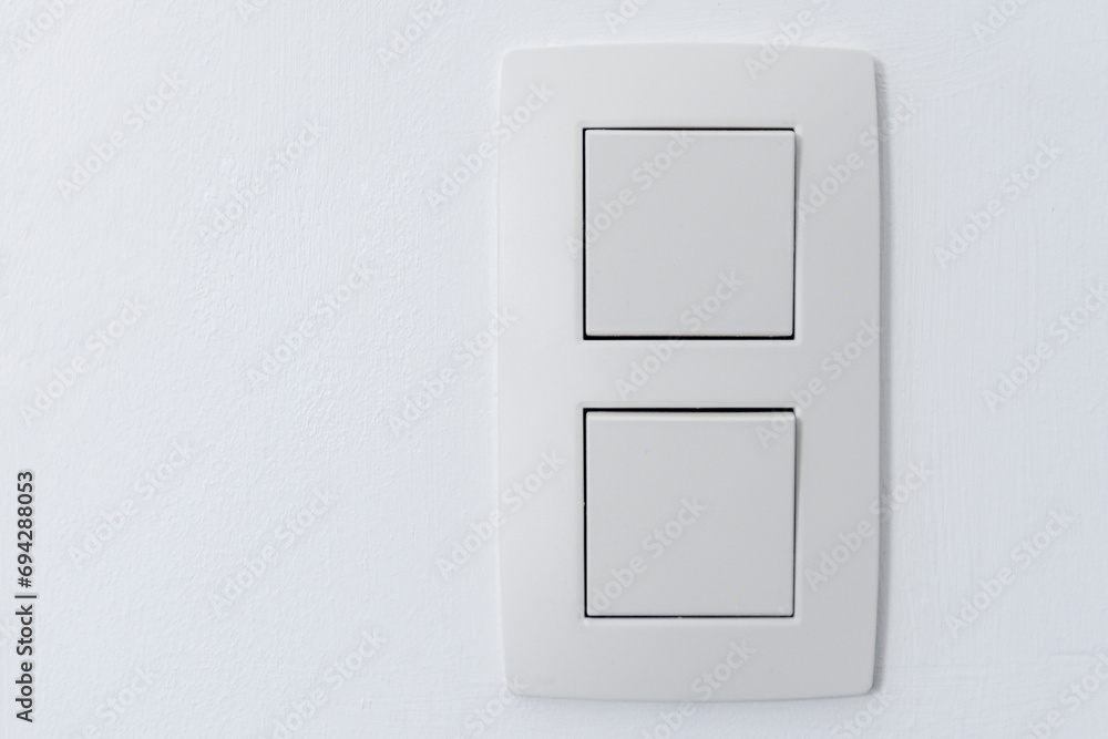 Close up of wall double light switch. Place for text Close up of wall double light switch. Place for text