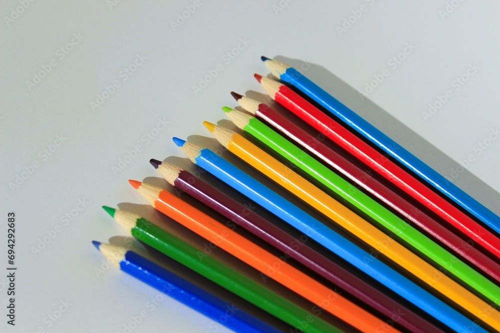 Lots of colored pencils on white background Lots of colored pencils on white background