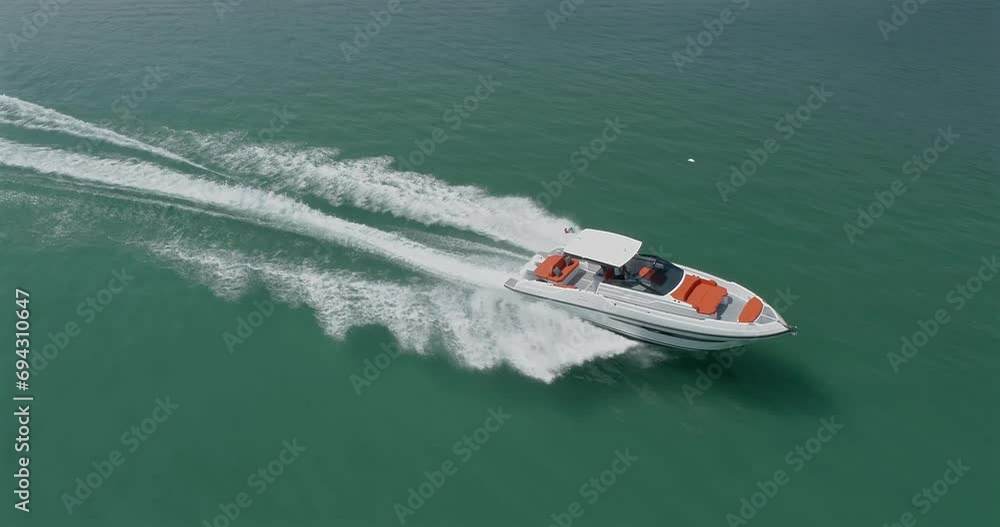 aerial view of motor yacht on the lake of iseo, italy aerial view of motor yacht on the lake of iseo, italy