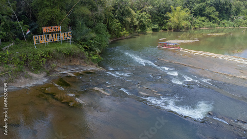 Pulau Mas tourist attraction, a tourist attraction located in the upper reaches of the Central River Regency where the water flows directly from the Meratus mountains, Meratus mountains, Mas Island photo