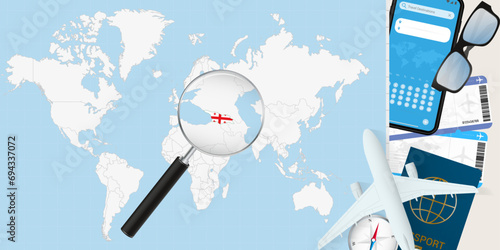 Georgia is magnified over a World Map, illustration with airplane, passport, boarding pass, compass and eyeglasses.