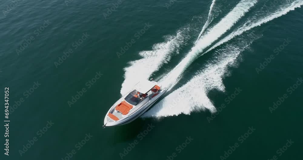 aerial view of motor yacht on the lake of iseo, italy aerial view of motor yacht on the lake of iseo, italy