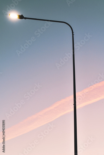 Sunset in the sky with a Streetlight
