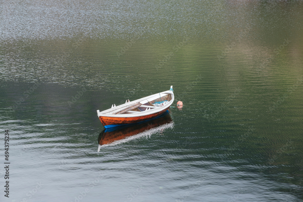 Vacation concept with boats at idyllic fjord in norway Vacation concept with boats at idyllic fjord in norway