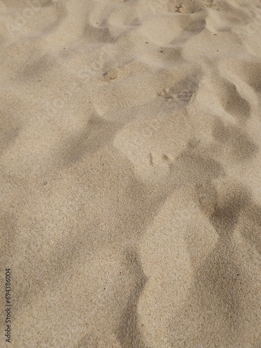 wavy beach sand, taken at Melasti Beach Ungasan, Bali, Indonesia photo