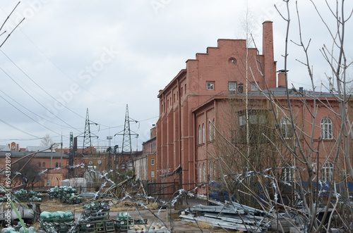 Industrial building of the fuel power plant with a pipe