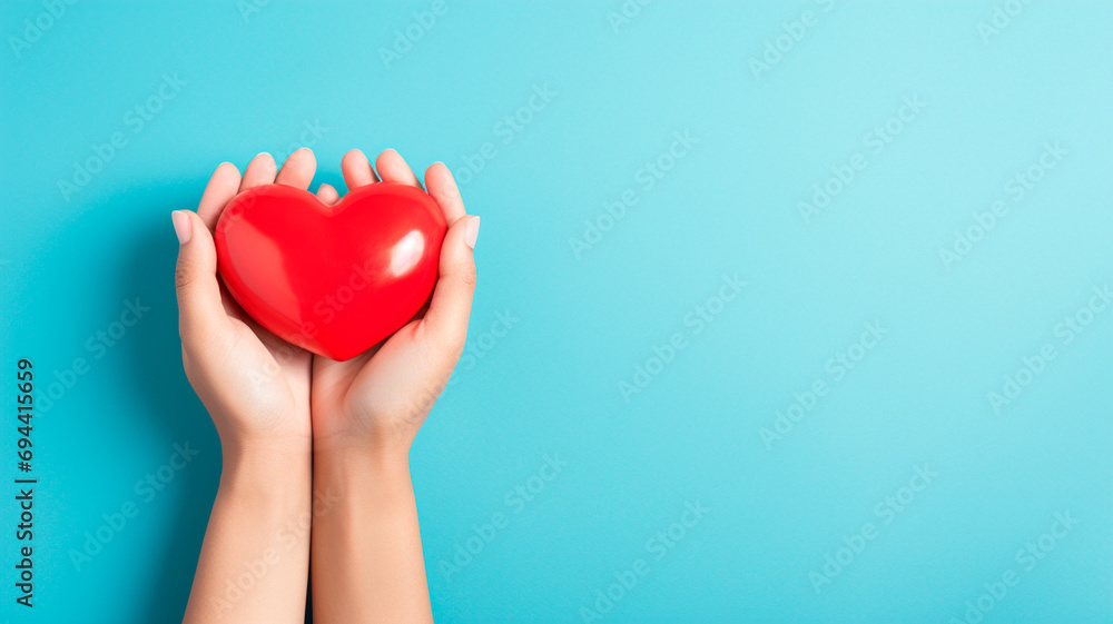 Fototapeta premium hands of red heart