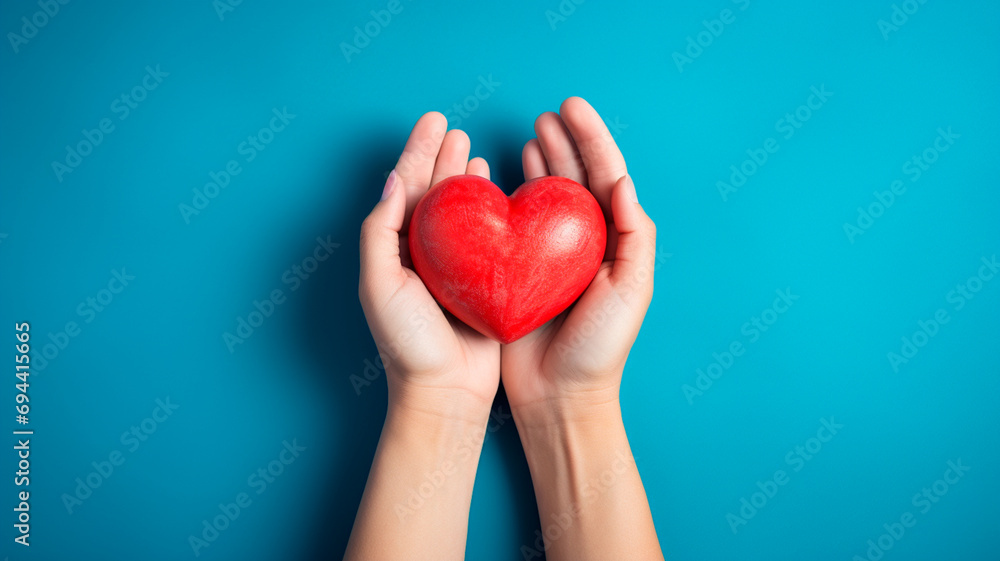 Fototapeta premium hands of red heart