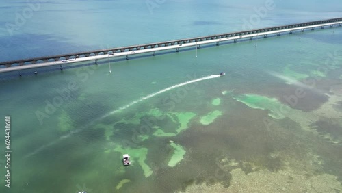 Aerial view of boats and island next to the Seven Mile Bridge near Marathon in the  Florida Keys, Monroe County, United States.  photo