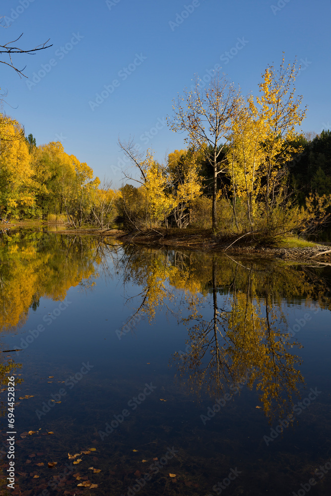 Russia. South of Western Siberia, Kuzbass. A windless sunny evening at the Pritomsky quarries of Novokuznetsk in the middle of autumn. Russia. South of Western Siberia, Kuzbass. A windless sunny evening at the Pritomsky quarries of Novokuznetsk in the middle of autumn.
