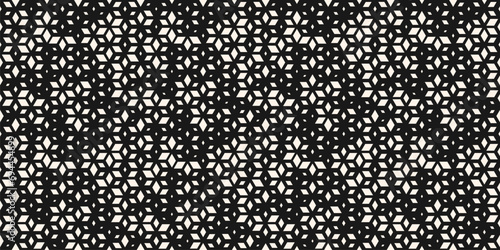 Elegant vector seamless pattern with small diamond shapes, floral silhouettes with halftone effect. Luxury modern black and white background. Simple monochrome texture. Trendy dark repeated geo design