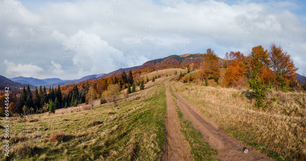 Autumn Carpathian Mountains and dirty countryside path, Ukraine. Autumn Carpathian Mountains and dirty countryside path, Ukraine.