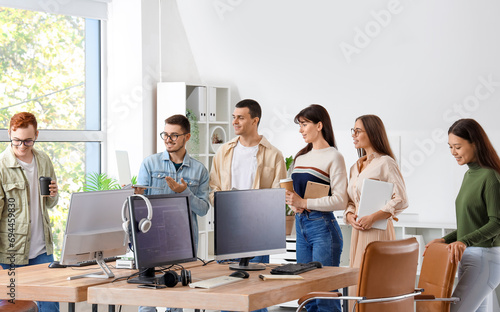 Team of young programmers w...