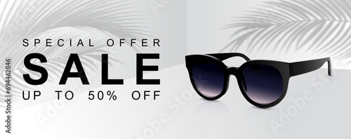 White sunglasses sale banne with tropical plant shadows. Summer sale 50 off. Coupon, voucher, discount flyer vector. photo