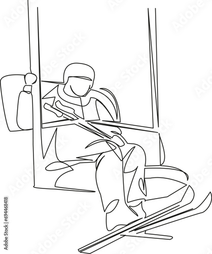 skier goes up on the ski lift