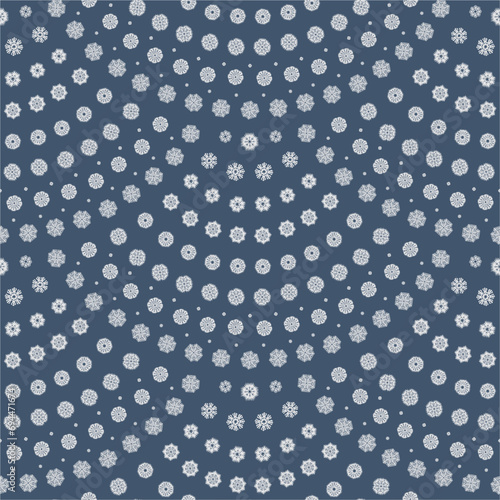 Small white snowflakes on a blue background. Christmas and New Year holiday wallpaper. Vector seamless wavy pattern with geometrical fish scale layout