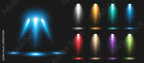 A set of blue and colored spotlights to illuminate the stage with rays on a black background. Luminous transparent lighting effects. Vector illustration.