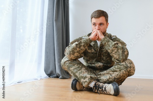 Obraz na plátně Portrait of middle aged sad, desperate military man