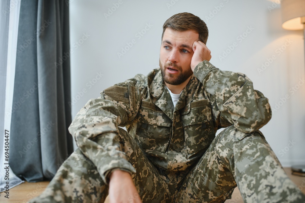 Crying professional soldier with depression and trauma after war