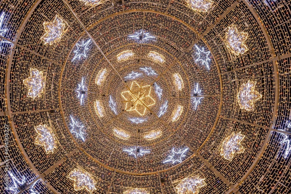 Naklejka premium Interior view of Christmas tree in Puerta de Jerez (Jerez door) in Seville, Andalusia, Spain