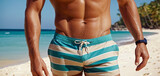 An adult Caucasian man with six pack abs, wearing bright swimming trunks, standing or walking on the sandy beach, tropical, attractive handsome strong muscular, fictional location