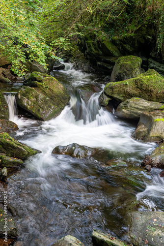 Long exposure of a waterfall on the East Lyn River at Watersmeet in Exmoor National Park