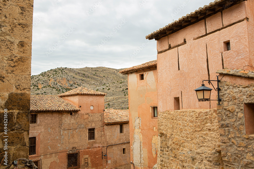 Stone and adobe walls of the ancient medieval village of Albarracín in Teruel (Spain).