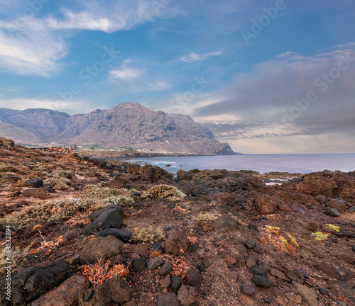 Volcanic and rocky ocean shores on the island of Tenerife. Spain.