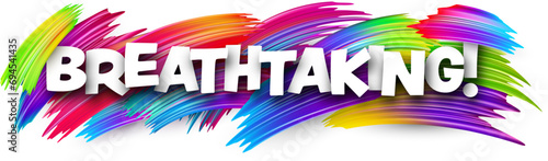 Breathtaking paper word sign with colorful spectrum paint brush strokes over white.