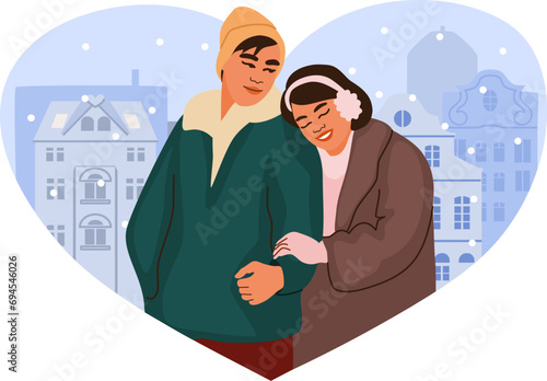 Romantic couple in warm winter clothes hugging and having togetherness moment. Heart shaped european city background. Man and woman in love. 