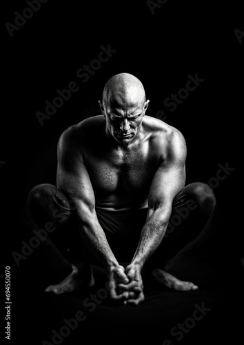 Black and white photo of a bodybuilder, middle aged, bald, handsome and very strong, superhuman, detailed portrait photography in very high resolution