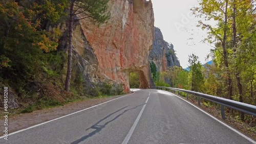 Tunnel hole at Serrania de Cuenca near Cuenca and Fuertescusa. Door to hell, Puerta del Infierno, Tuneles excavados en roca del Rio Escabas, Spain Europe. photo