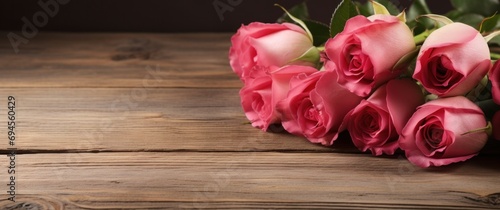 valentines day red roses on wood background