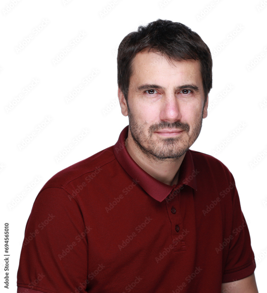 A picture of a man with a beard, mustache and fashionable hairstyle, dressed in a casual polo shirt, posing in a studio with a serious expression on a light background A picture of a man with a beard, mustache and fashionable hairstyle, dressed in a casual polo shirt, posing in a studio with a serious expression on a light background