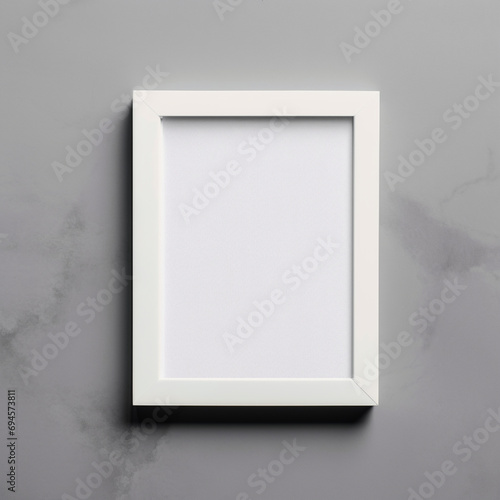 Fotografia de estilo mockup de marco en blanco sobre fondo de tonos grises