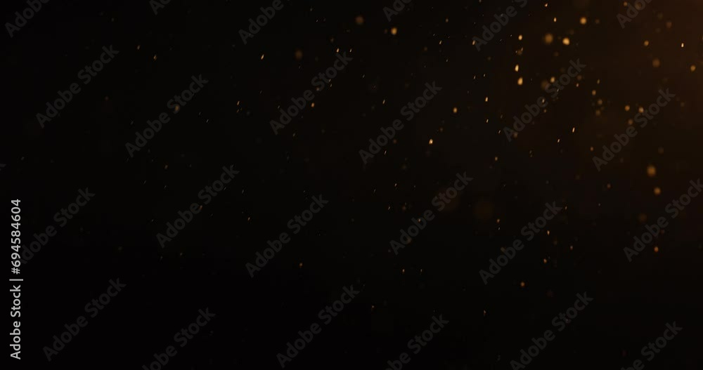 Video of slow-motion snowfall at night under a yellow streetlight. Video of slow-motion snowfall at night under a yellow streetlight.