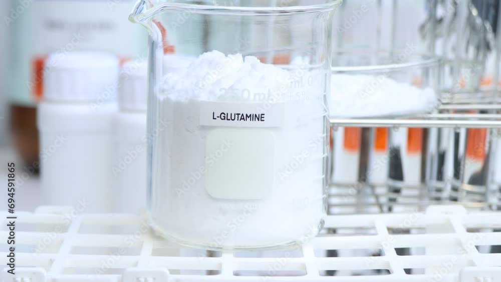 L-GLUTAMINE powder in chemical container , chemical in the laboratory and industry, Raw materials used in production or analysis L-GLUTAMINE powder in chemical container , chemical in the laboratory and industry, Raw materials used in production or analysis