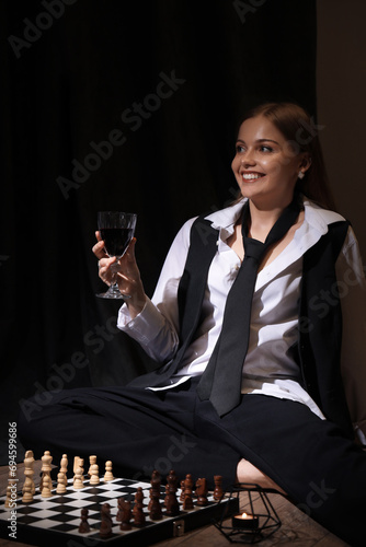 Young woman with glass of w...