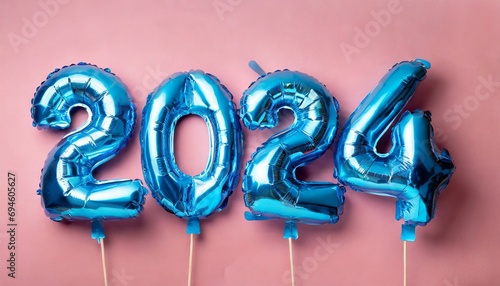 New 2024 Year. Blue number shaped balloons on pink background